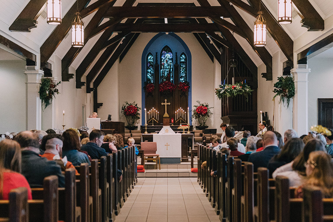Greenery and candles around the Sanctuary at St. Martin Episcopal Church