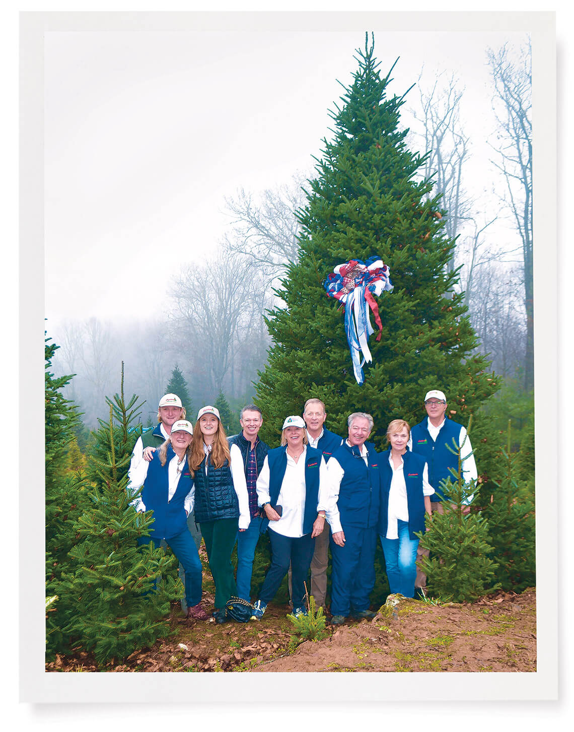 The Cartner family in front of their Fraser Fir Christmas Tree Farm