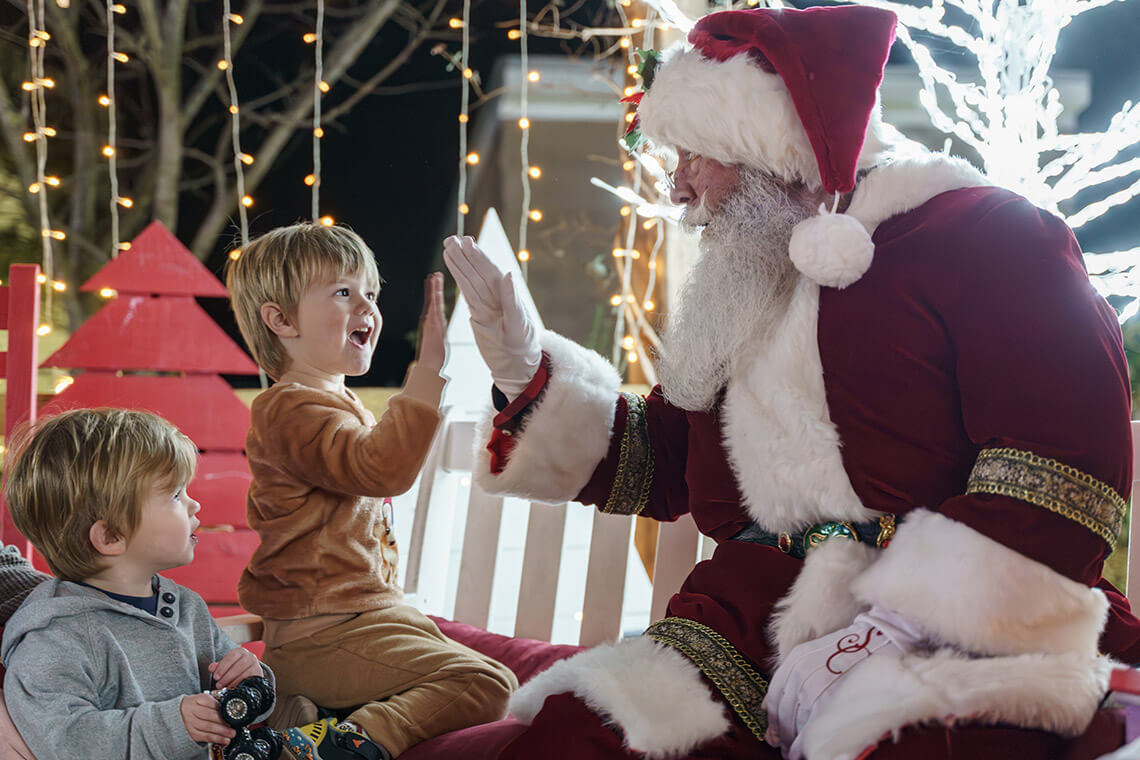 Children meet Santa at the Greensboro Science Center
