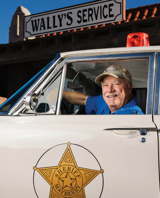 Mike Cockerham in his vintage squad car