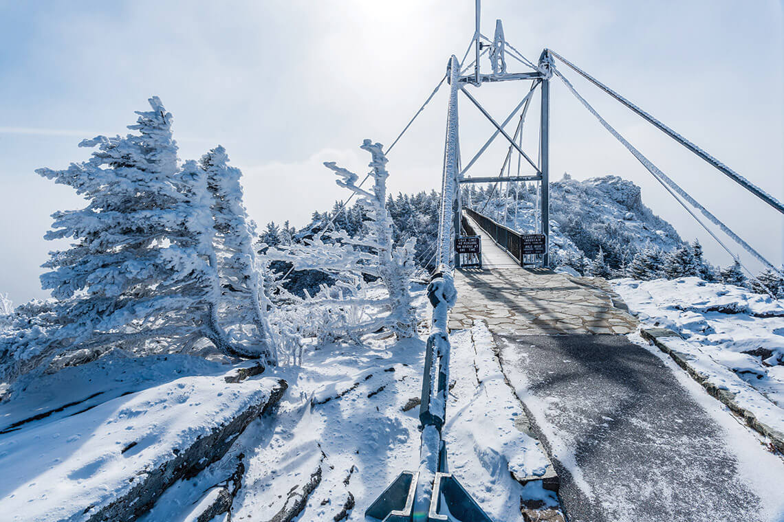 The Mile-High Swinging Bridge at Grandfather Mountain, covered in snow