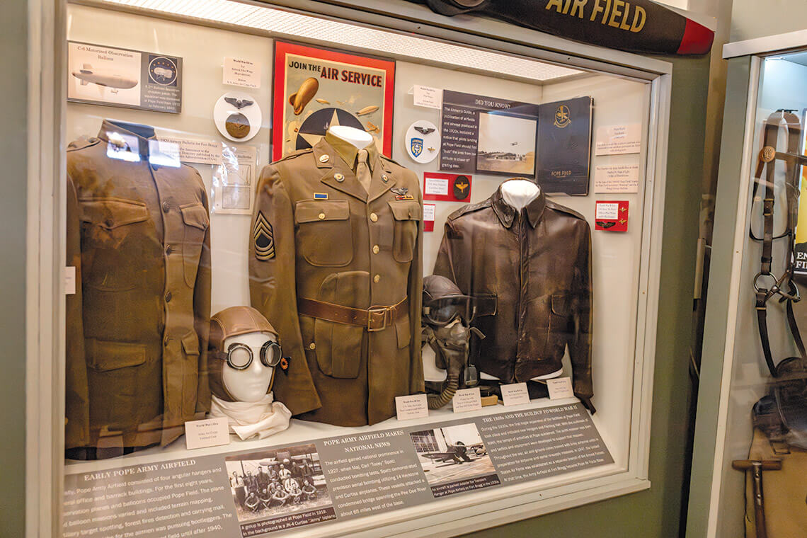 Display of World War I uniforms at the Fayetteville History Museum
