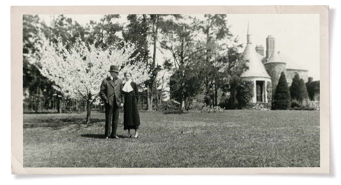 Bowman and Nathalie Gray beside dogwoods at Graylyn