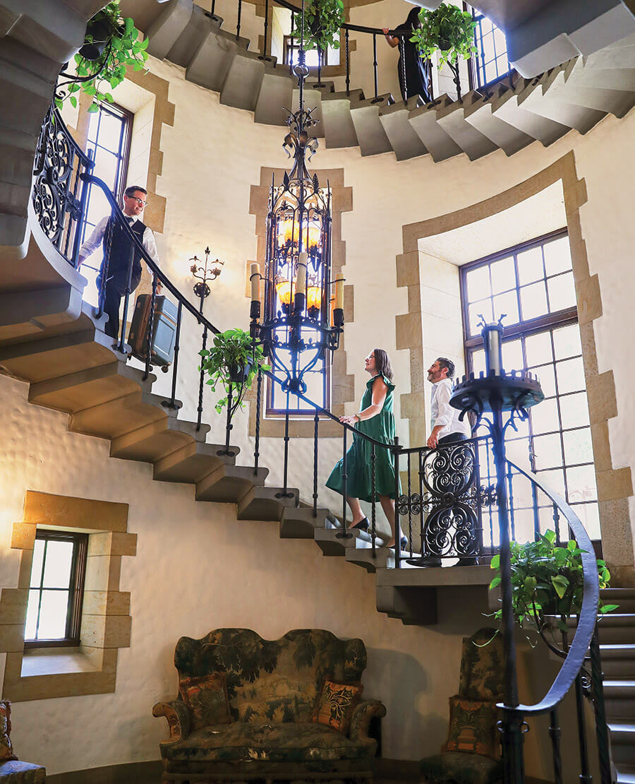 Guests climb the stairs at Graylyn