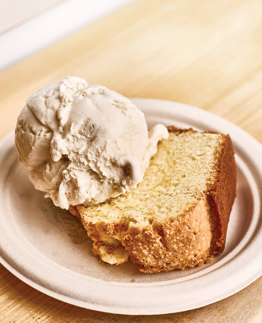 Slice of pound cake topped with ice cream
