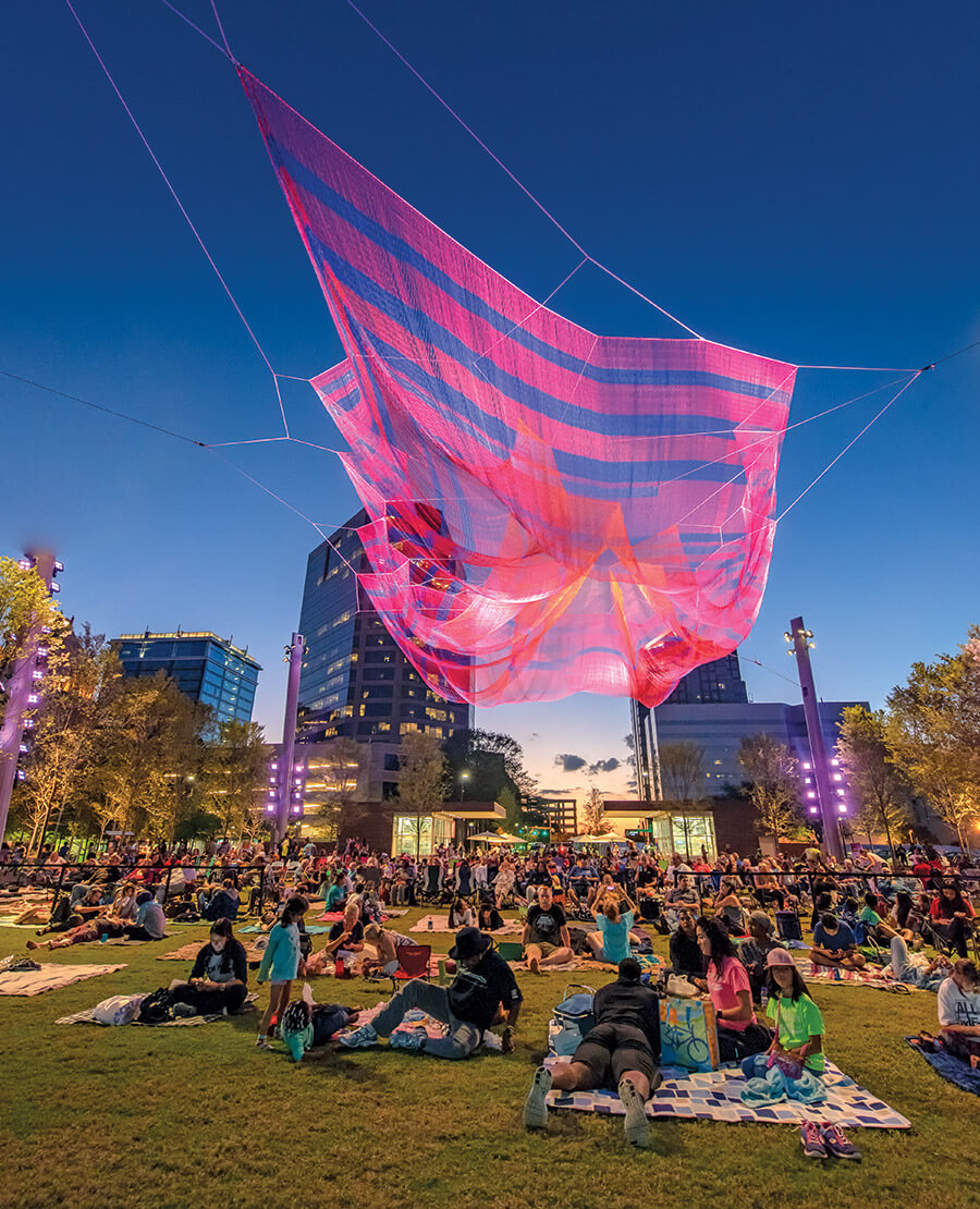 People under Where We Met Aerial Installation at LeBauer Park