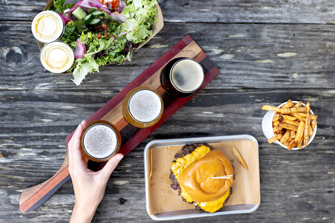 Flight of beers and burger at Whiteside Brewing