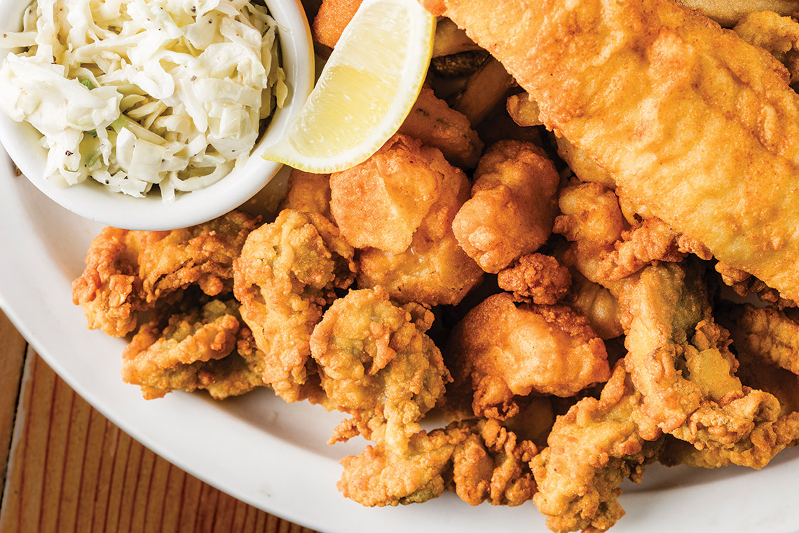 Plate of fried oysters and fish