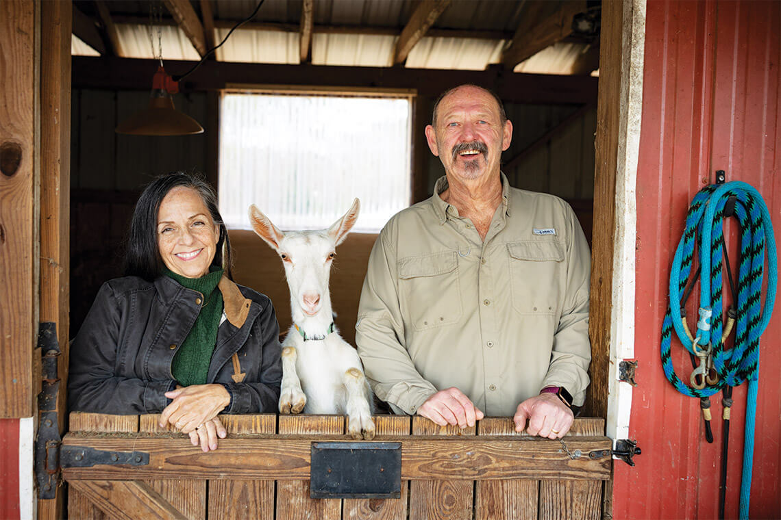 Lisa, Kenny, and a goat from Hank E. Panky Farm