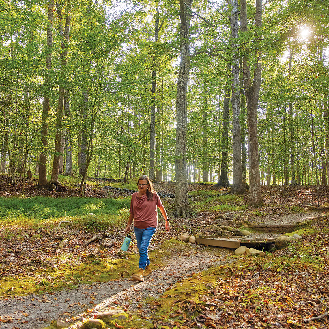 The author walks in the woods at St. Francis Springs