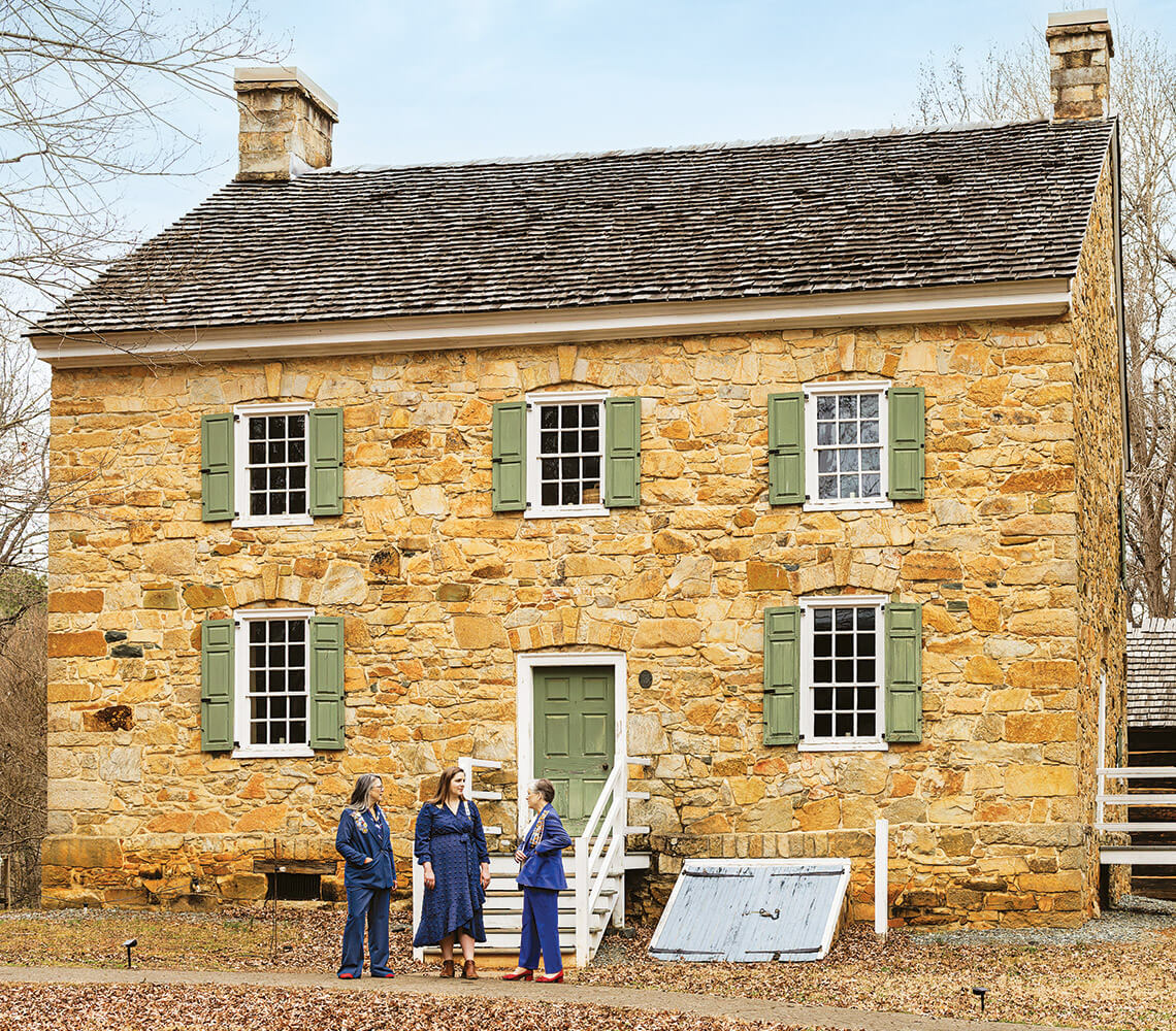 Shelly Kiker, Louanne Woznicki, Laura Morris Giust outside the Rock House
