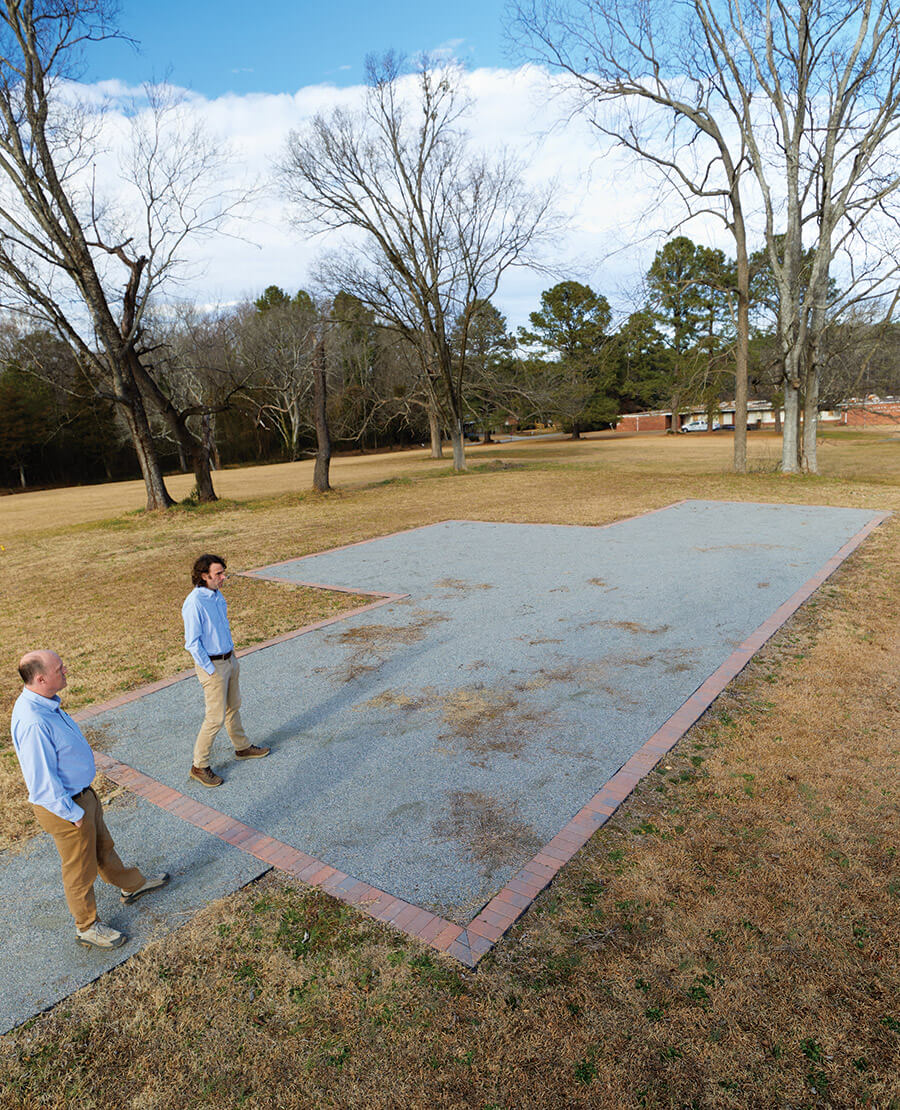 Carl Burke and Frank McMahon stand on the site of the colonial Halifax Courthouse