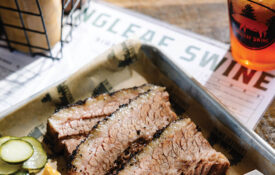 Platter of brisket and sides from Longleaf Swine