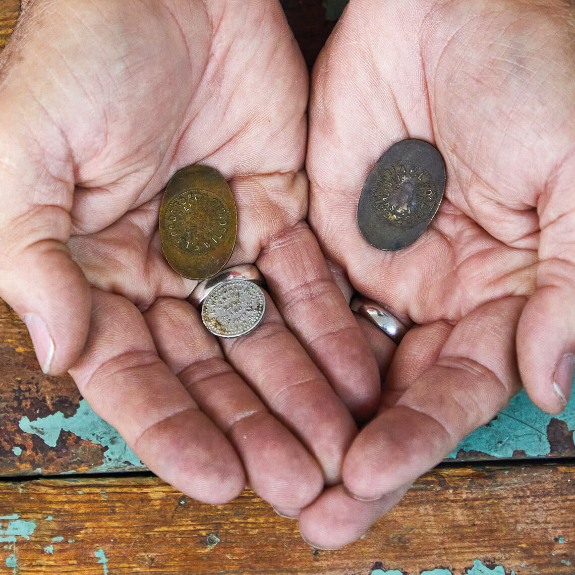 Miller holds minted coins