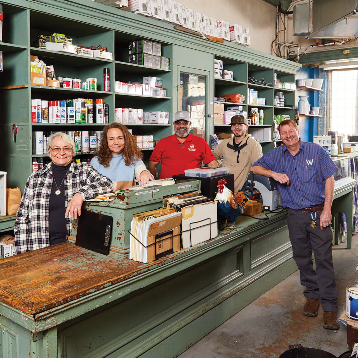 The Womble family inside Womble Hardware & P.L. Woodard & Co. 