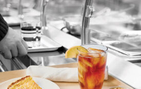 Cafeteria tray with cod, slaw, and egg custard pie