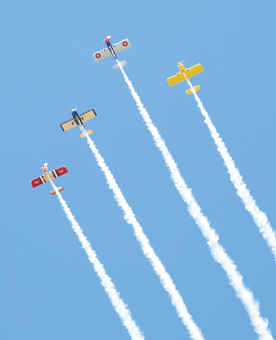 Four planes fly in a veteran salute