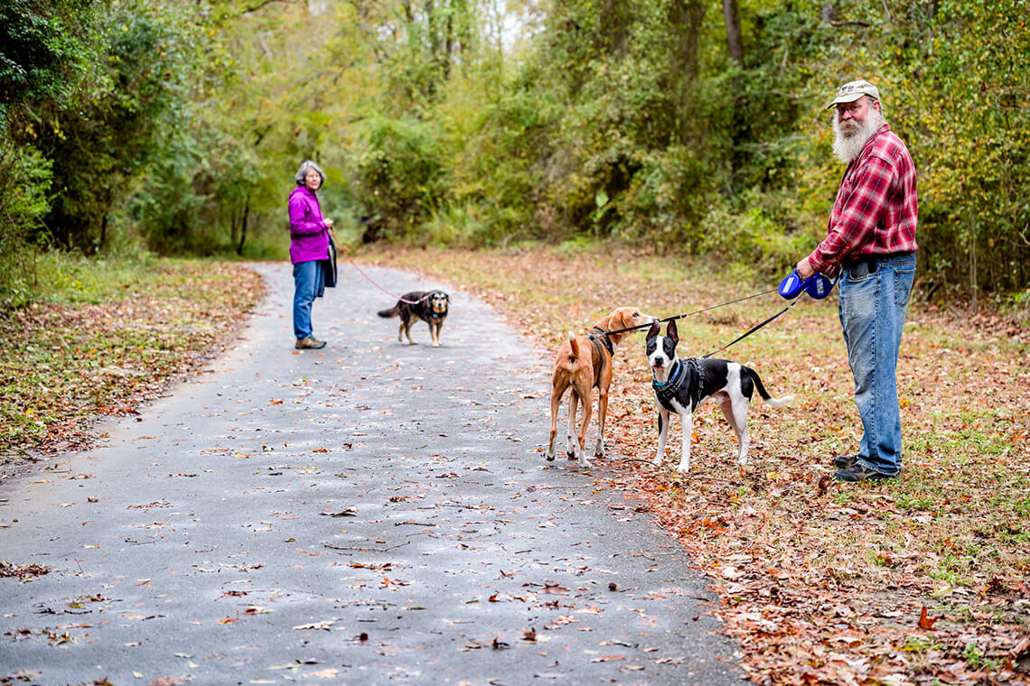 People and dogs on the South Tar River Greenway