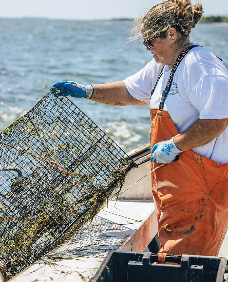 Vicki Basnight checks a crabpot