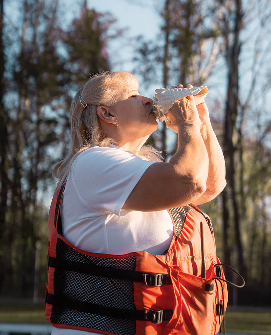 Tammy sounds a conch shell