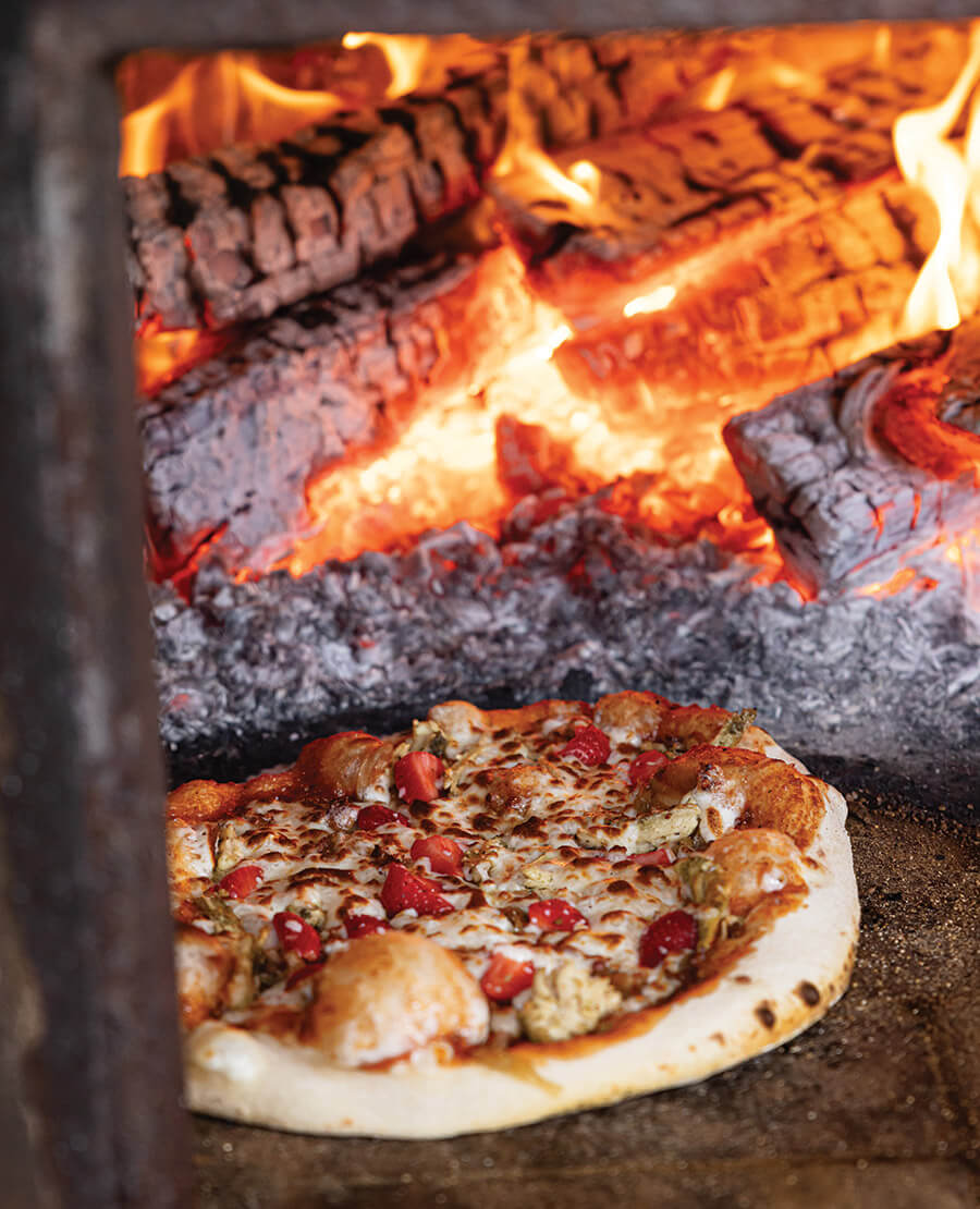 Strawberry pizza cooks at The Ten Acre Garden