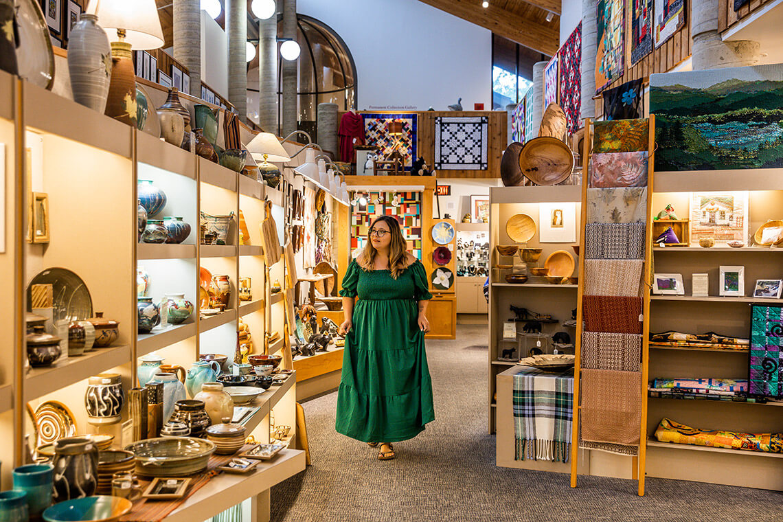 Woman shops at the Folk Art Center