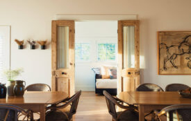 A beach home dining room designed by Nicole Peters
