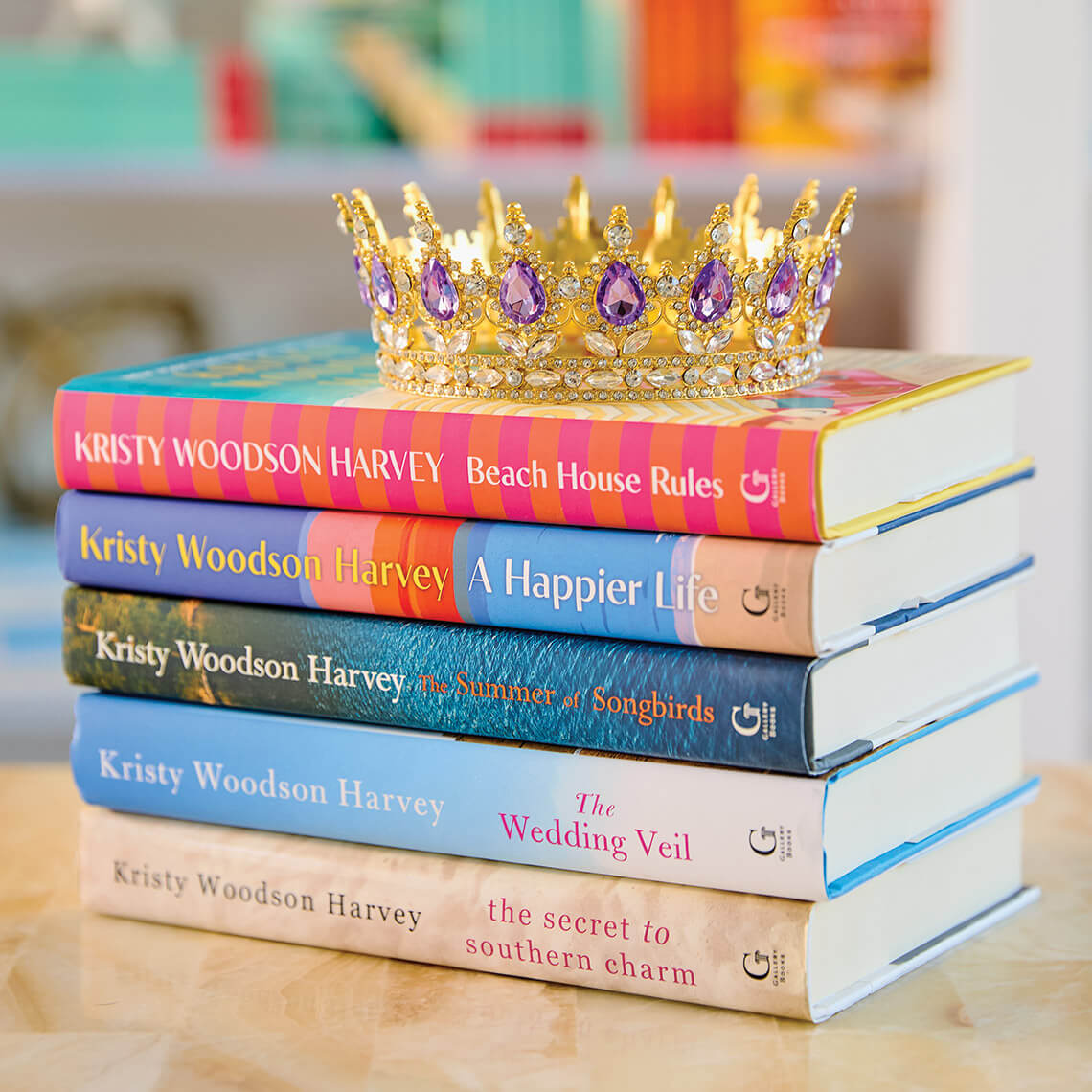 Stack of books by Kristy Woodsen Harvey