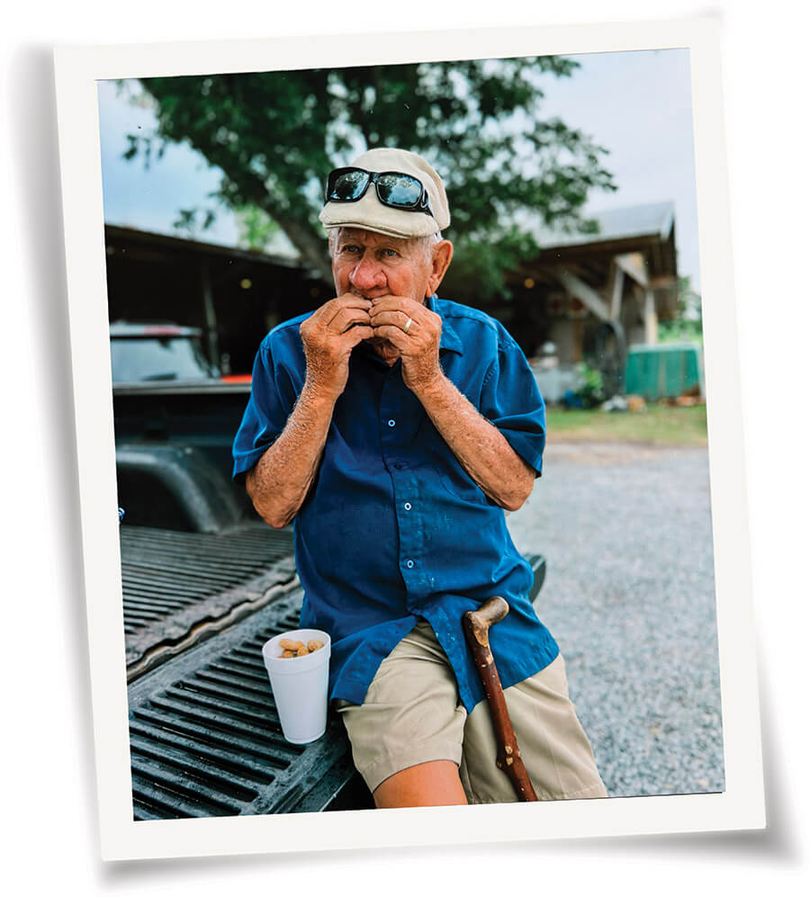 Mr. Benny eating boiled peanuts