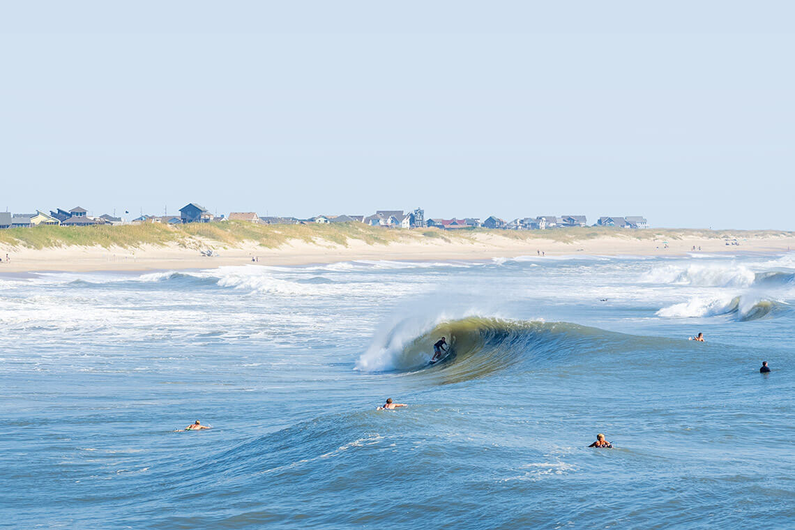 Surfers in Avon, North Carolina.