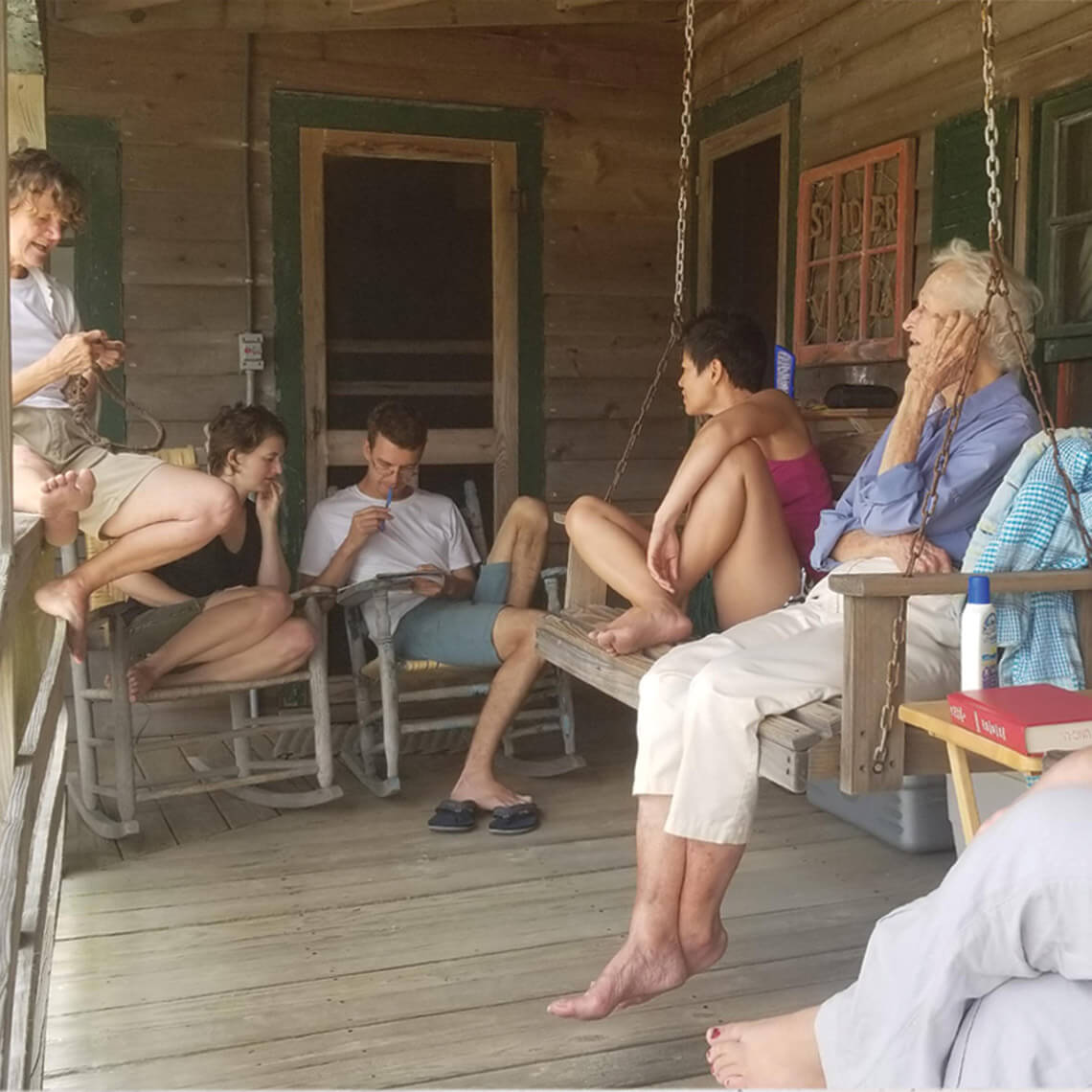 View of family on the porch at Spider Villa in Nags Head