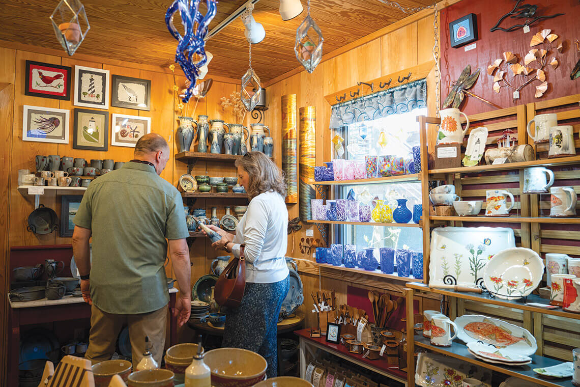 People shop in the Village Craftsmen