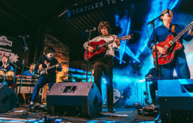 musician performs at Milltown Get Down