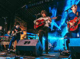 musician performs at Milltown Get Down