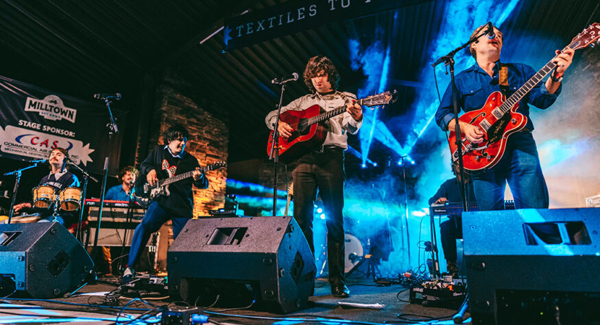 musician performs at Milltown Get Down