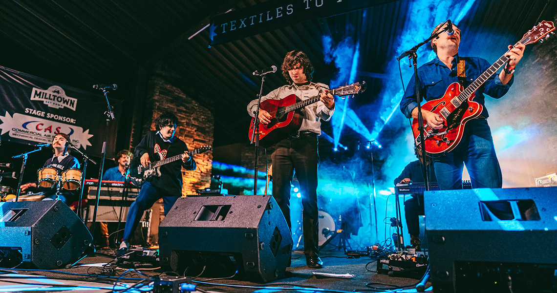 musician performs at Milltown Get Down