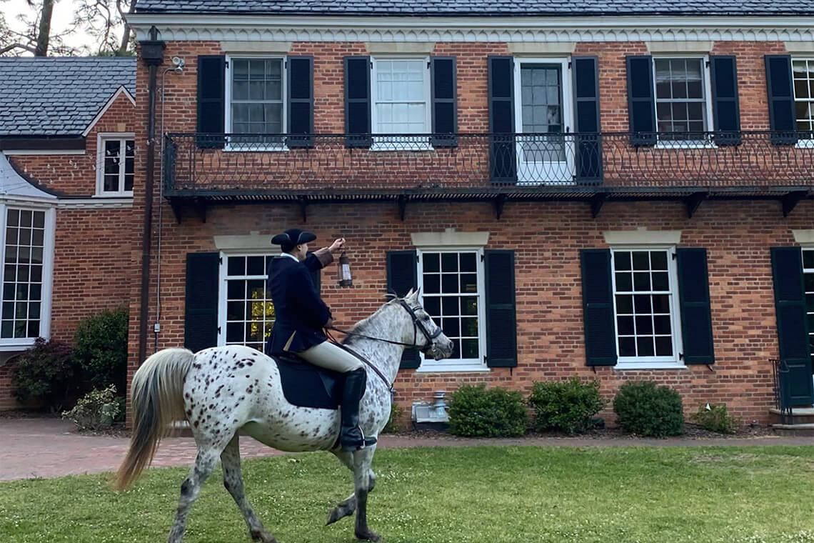 Person on horseback outside of the Weymouth Center