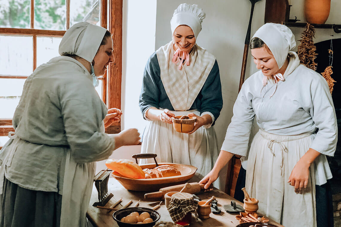 Women in heritage kitchen at Bethabara in Winston-Salem
