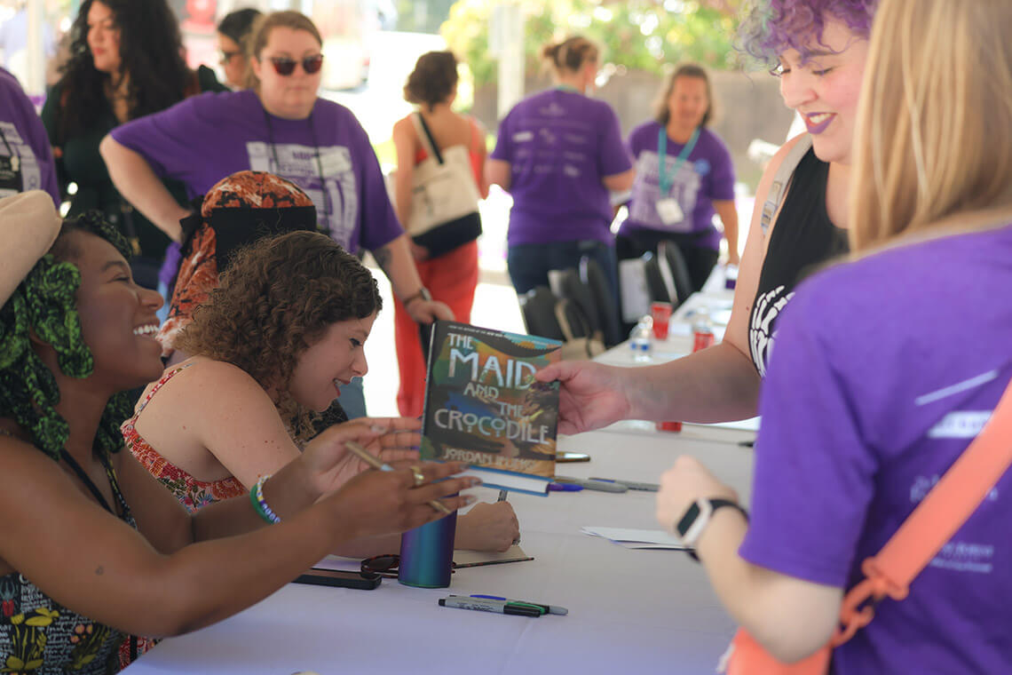 Books being signed at Bookmarks Festival of Books & Authors