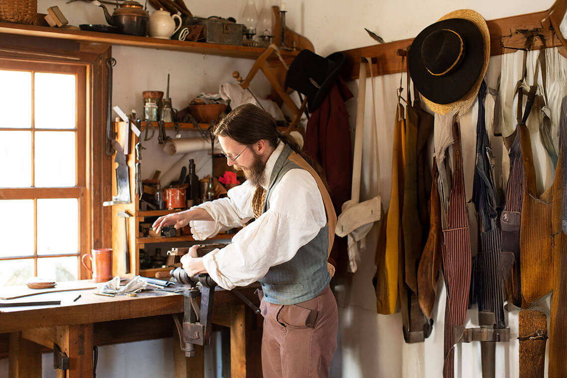 Old Salem interpreter conducts blacksmithing