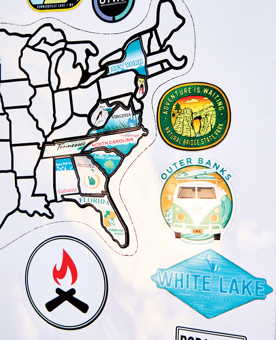 Map of United States with stickers on different states 