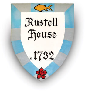 Handpainted sign for the Rustell House