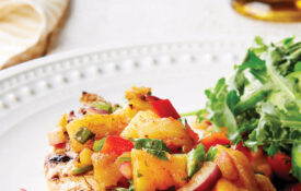 Fish topped with pineapple salsa