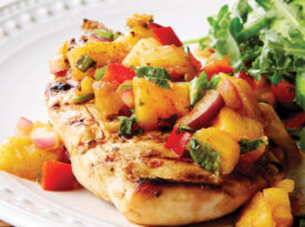 Fish topped with pineapple salsa