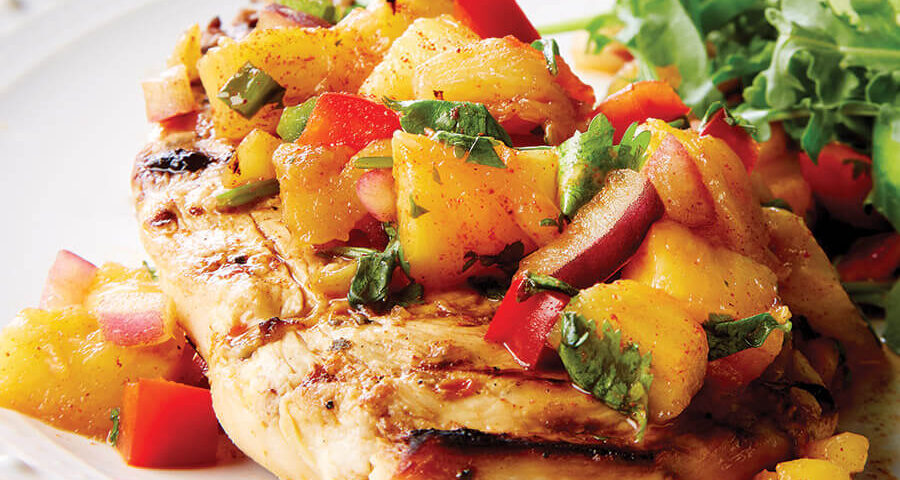 Fish topped with pineapple salsa