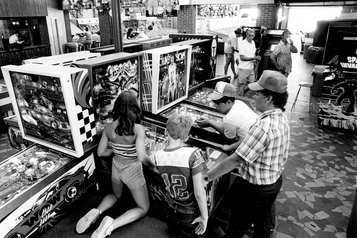 Children play arcade games at Goldston's Beach 
