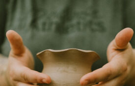 Hands form a vase