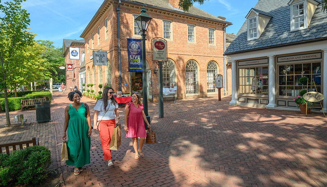 Family wanders through Williamsburg's Merchants Square