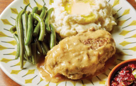 Plate with Salisbury steak, green beans, and potatoes
