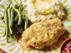 Plate with Salisbury steak, green beans, and potatoes